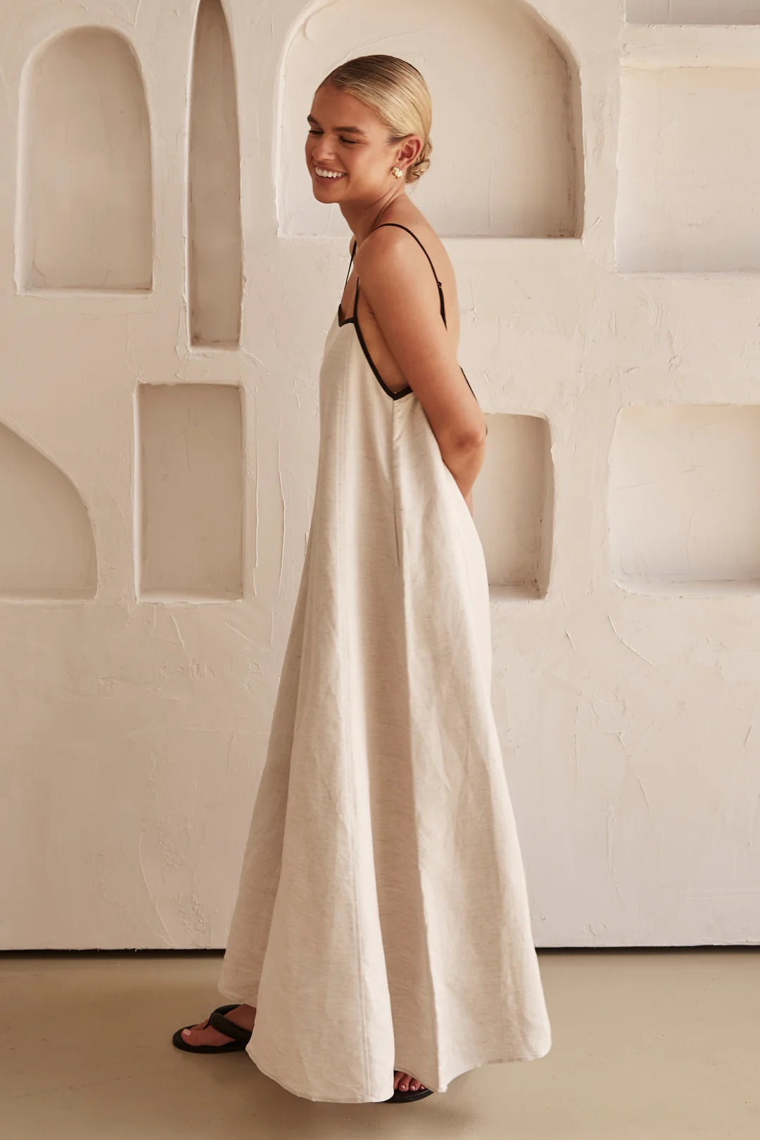 Women's cream spaghetti strap maxi dress, summer-ready with a square neck and elegant contrast trim.