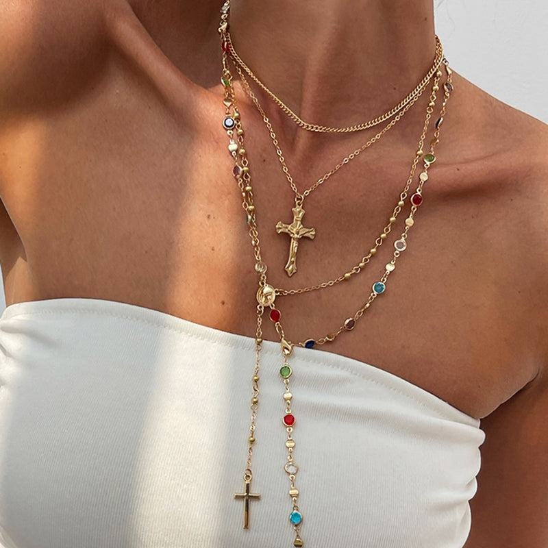 Elegant cross layered necklace set for women, featuring a gold-plated finish, perfect fashion accessory.