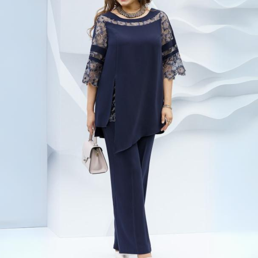 Sophisticated women's dark blue matching set: elegant blouse & trousers for a formal or casual ladies fashion look.