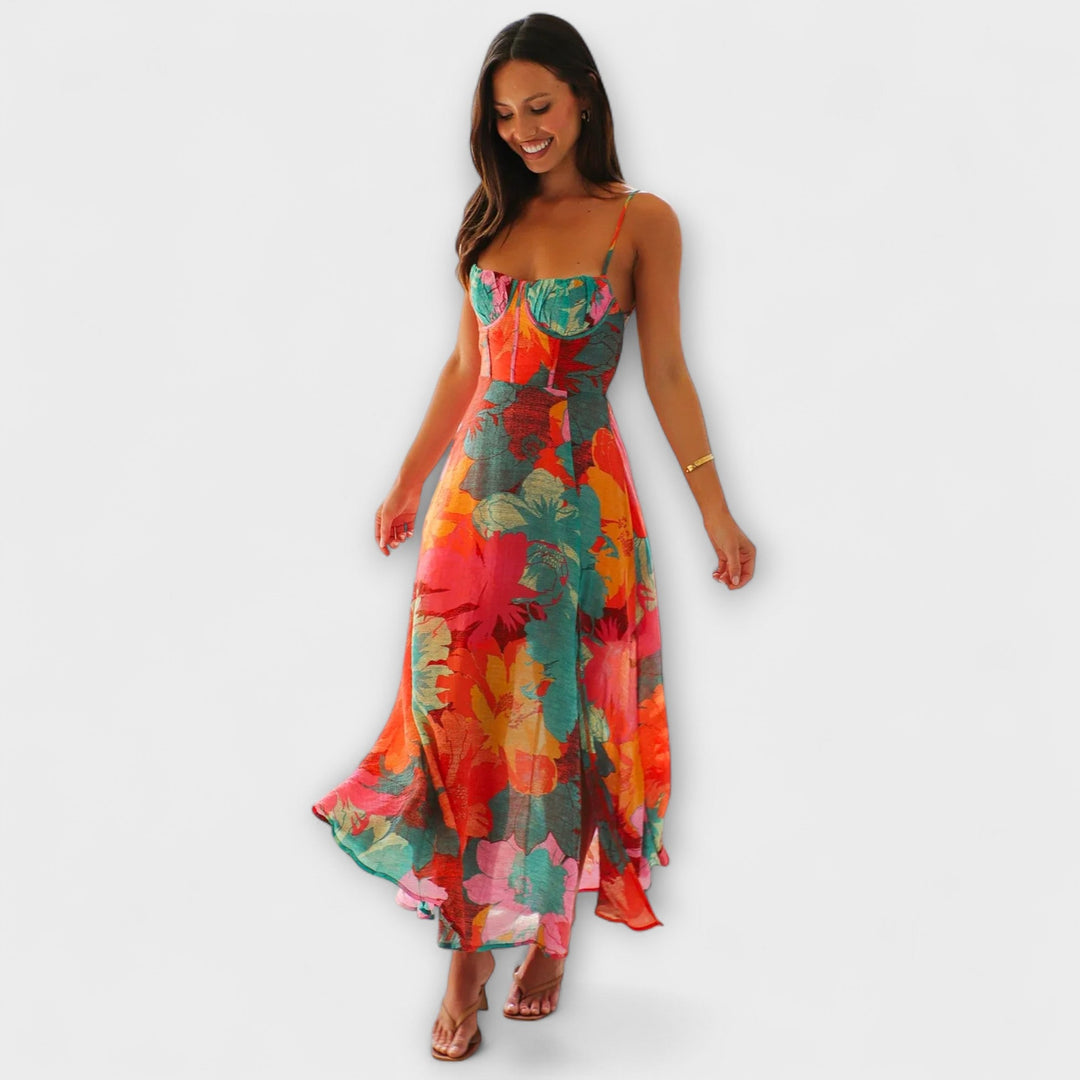 Women's elegant floral print midi strap dress. Perfect summer party, event & occasion wear. Flattering fit, cool tones.