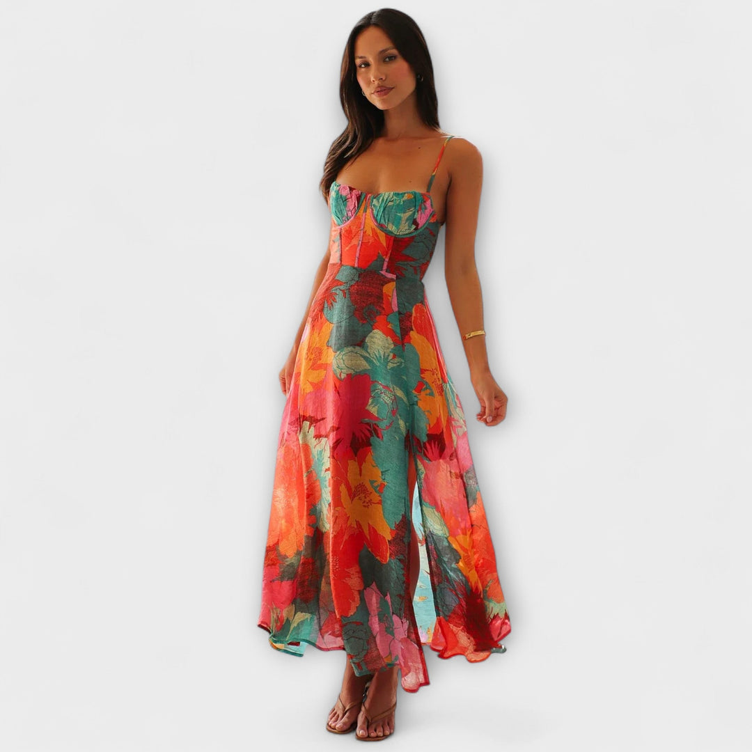 Stylish women's floral midi dress for summer events. Elegant strap design, flattering fit, cool tone floral print.