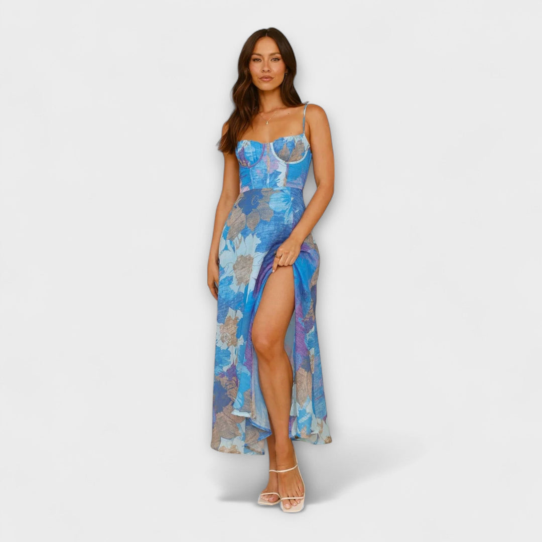 Cool tone floral print midi dress for women. Elegant strap design, flattering for summer parties & special events.