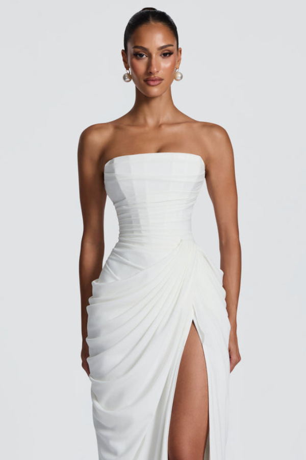 Elegant women's flowing dress, ideal as a wedding guest or party outfit.