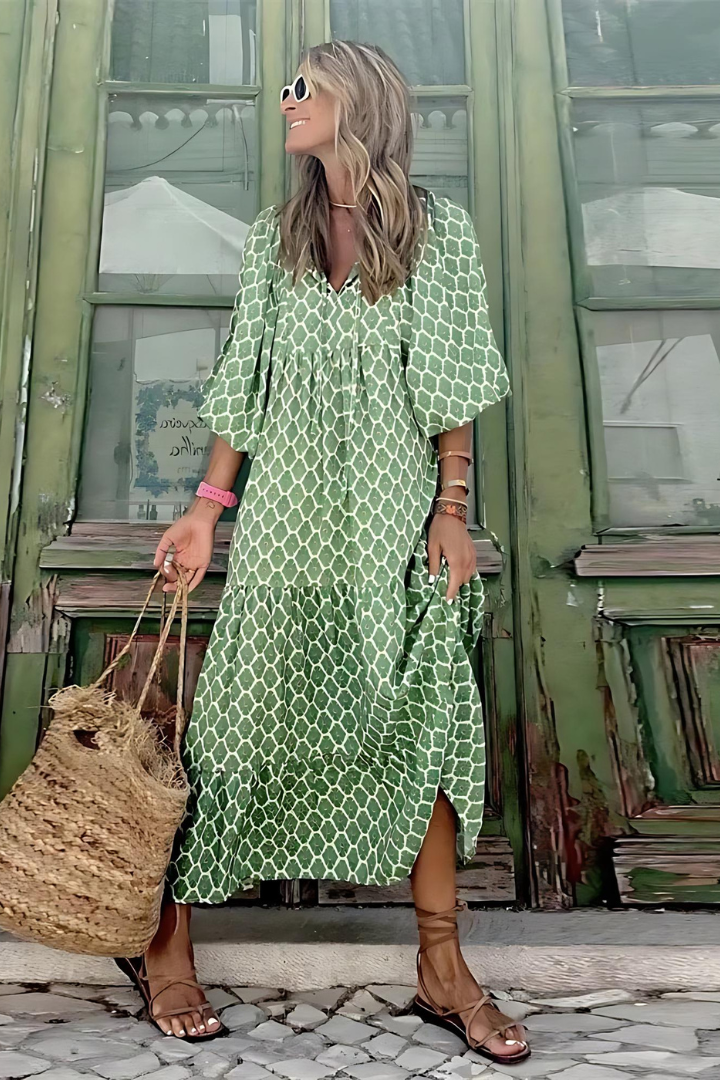 Women's sophisticated flowing maxi dress, long & elegant, ideal for formal wear.