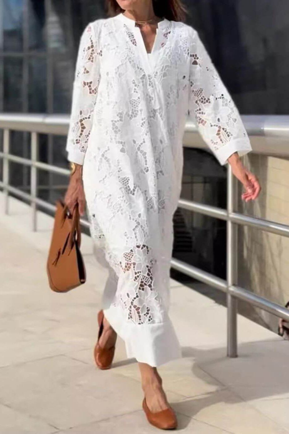 Elegant flowing white maxi dress for women, perfect for formal evenings, summer events, or resort wear. Timeless style.