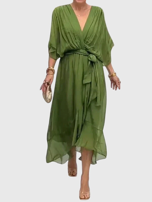 Elegant flowy V-neck summer dress for women, perfect for parties or everyday comfort.