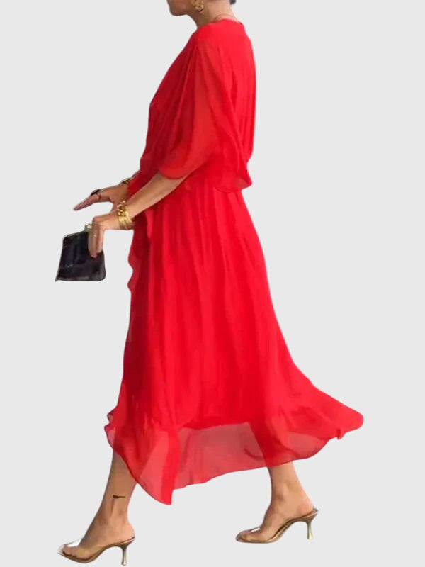 Light and flowy V-neck summer dress for women, ideal for warm weather style & comfort.