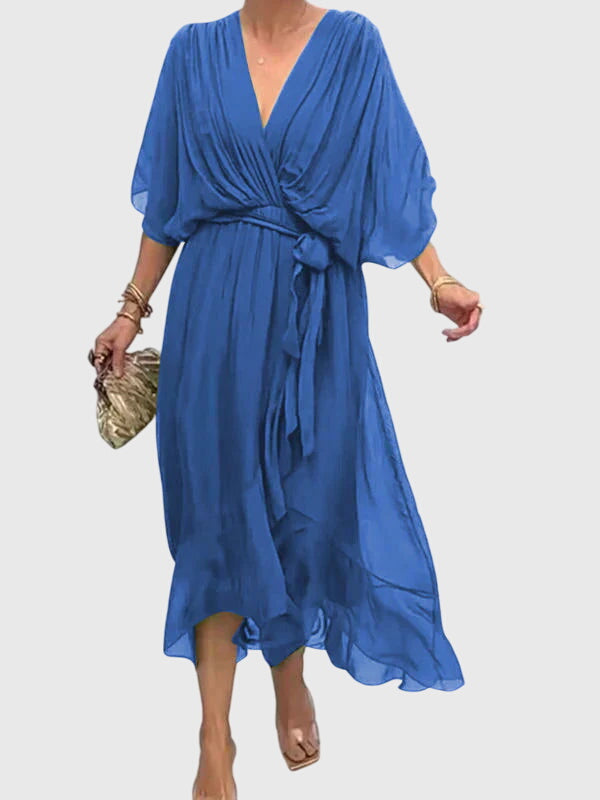 Comfortable women's flowy summer dress featuring a chic V-neck design, versatile for any event.