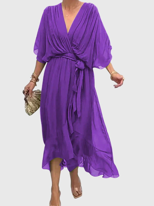 Soft, flowy V-neck midi dress for women, offering elegant summer style & comfort.