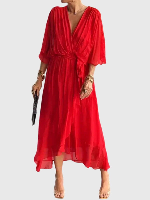 Elegant women's flowy V-neck summer dress, perfect for sophisticated summer fashion.