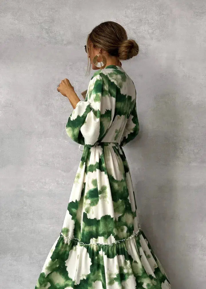 Flowy green women's maxi dress with elegant puff sleeves & V-neck, perfect for special occasions & formal wear.