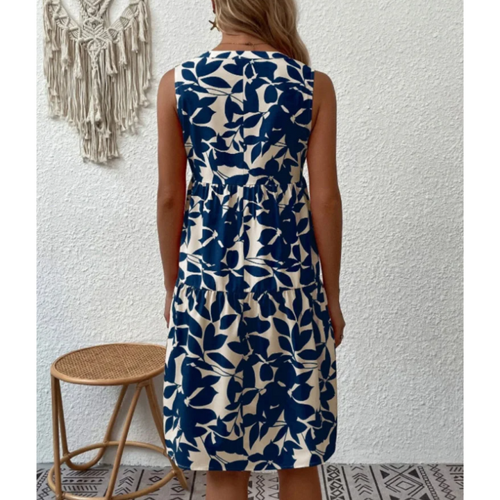 Timeless navy blue midi dress for women. Elegant, comfortable & versatile fashion for everyday & special events.
