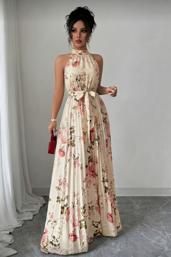 Flowy pleated women's maxi dress with a chic halter neckline & keyhole cutout. Great for summer events.