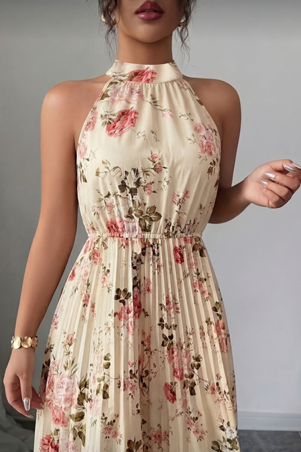 Sophisticated women's date night maxi dress. Features elegant halter, keyhole, and flowy pleated design.