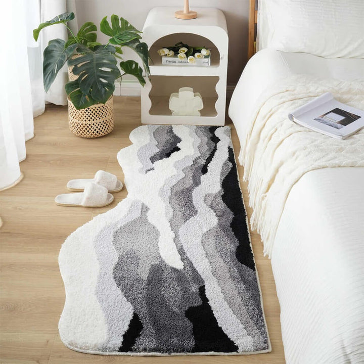 Luxury hand-tufted textured area rug with 3D wave pattern, perfect for an elegant bedroom or living room.