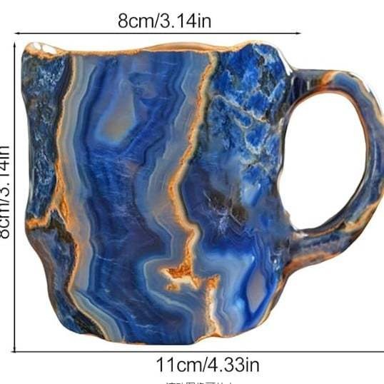 Close-up of an elegant crystal coffee mug showcasing its unique gemstone design and artisan quality.