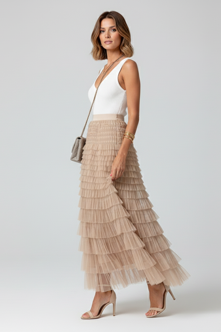 High waist tiered midi skirt for women, elegant and flowy with delicate ruffles and layered design.