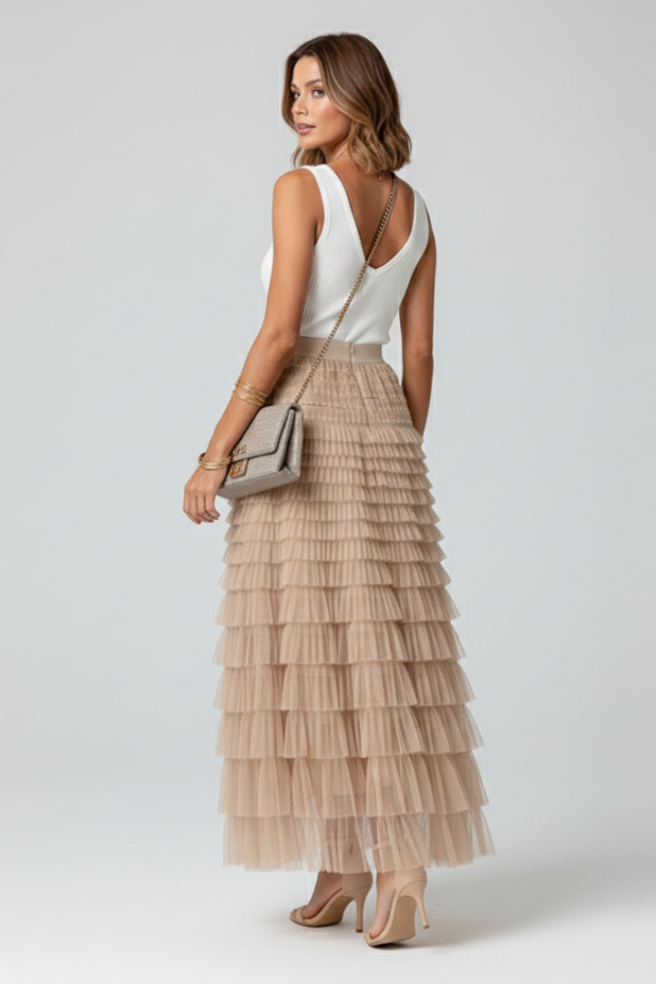 Romantic high waist midi skirt with elastic waist, offering a comfortable, elegant, and flowy silhouette.
