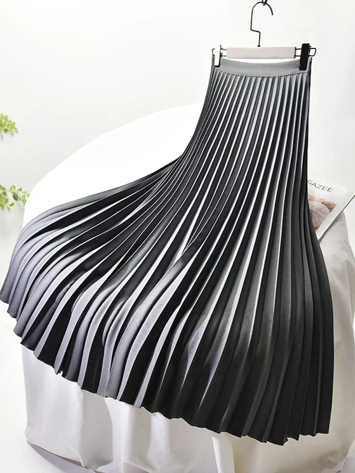 Versatile women's high-waist pleated midi skirt. Perfect for summer, fall, office, or an elegant party look.