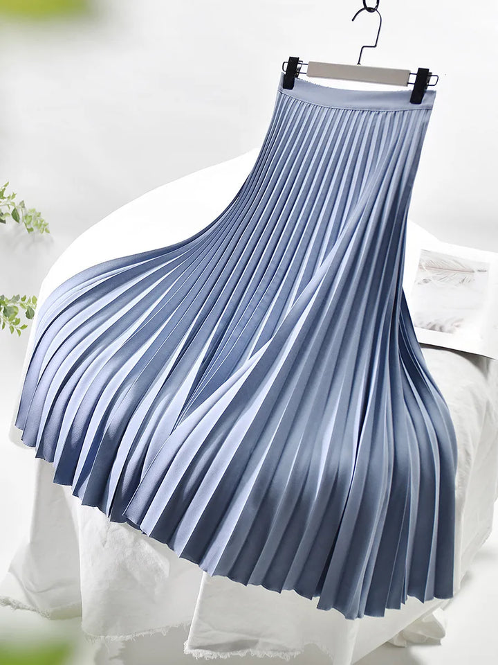 Lightweight summer fashion women's elegant high-waist pleated midi skirt. Flowy & comfortable for warm days.