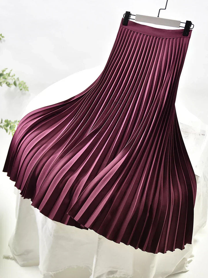 Stylish fall fashion women's elegant pleated midi skirt. High-waist, perfect for office, party or casual chic.