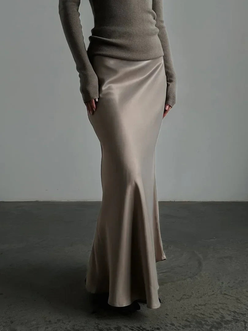 Chic women's long fishtail skirt with a high waist, ideal for special occasion wear.