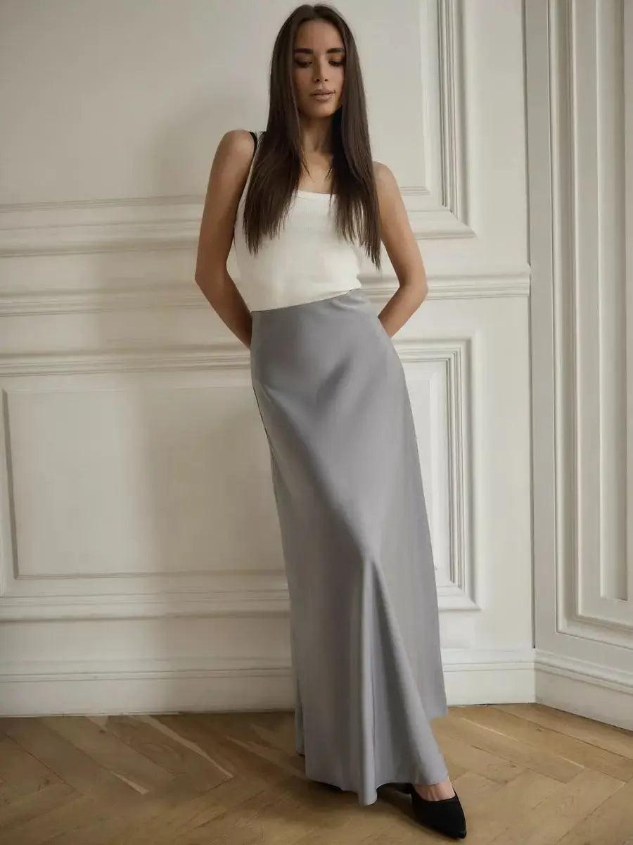 Refined women's high-waist fishtail maxi skirt, chic for evening formal wear.