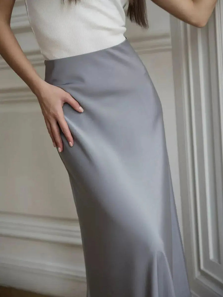 Stunning high-waisted fishtail maxi skirt, sophisticated women's formal attire.
