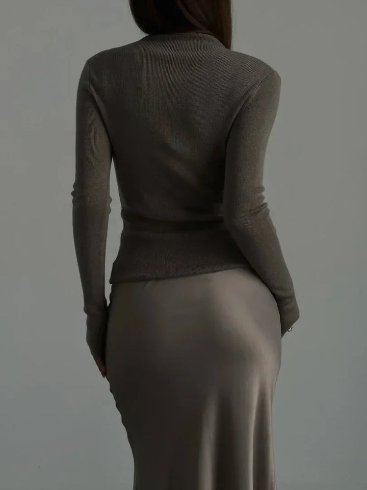 Elegant women's fishtail long skirt, high-waisted design for chic evening wear.