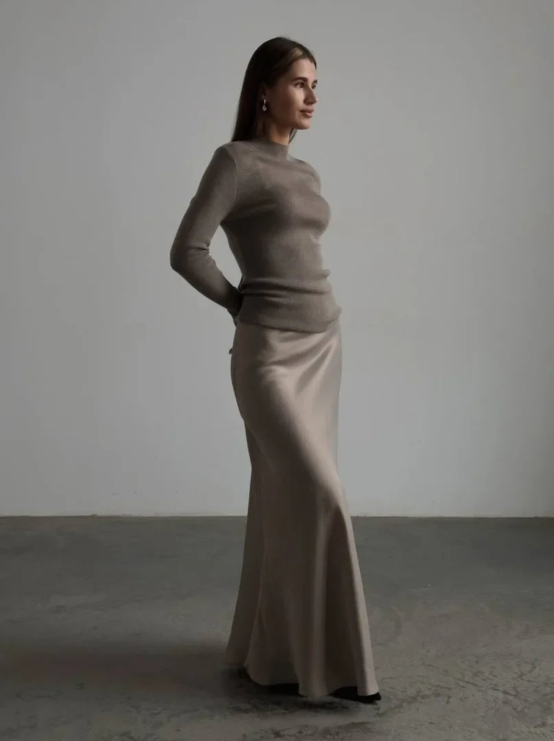 Sophisticated women's high-waisted fishtail maxi skirt for formal occasions.