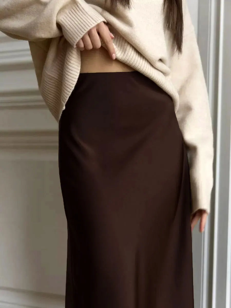 Beautiful women's elegant high-waisted fishtail maxi skirt for evening galas.