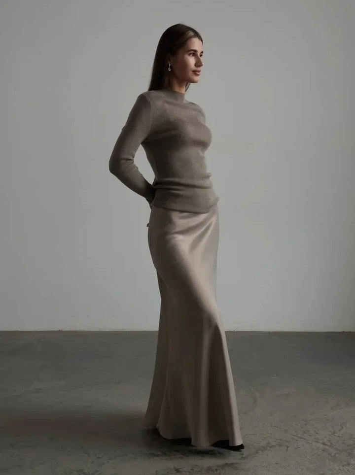 Chic women's high-waisted fishtail maxi skirt, ideal for formal evening parties.