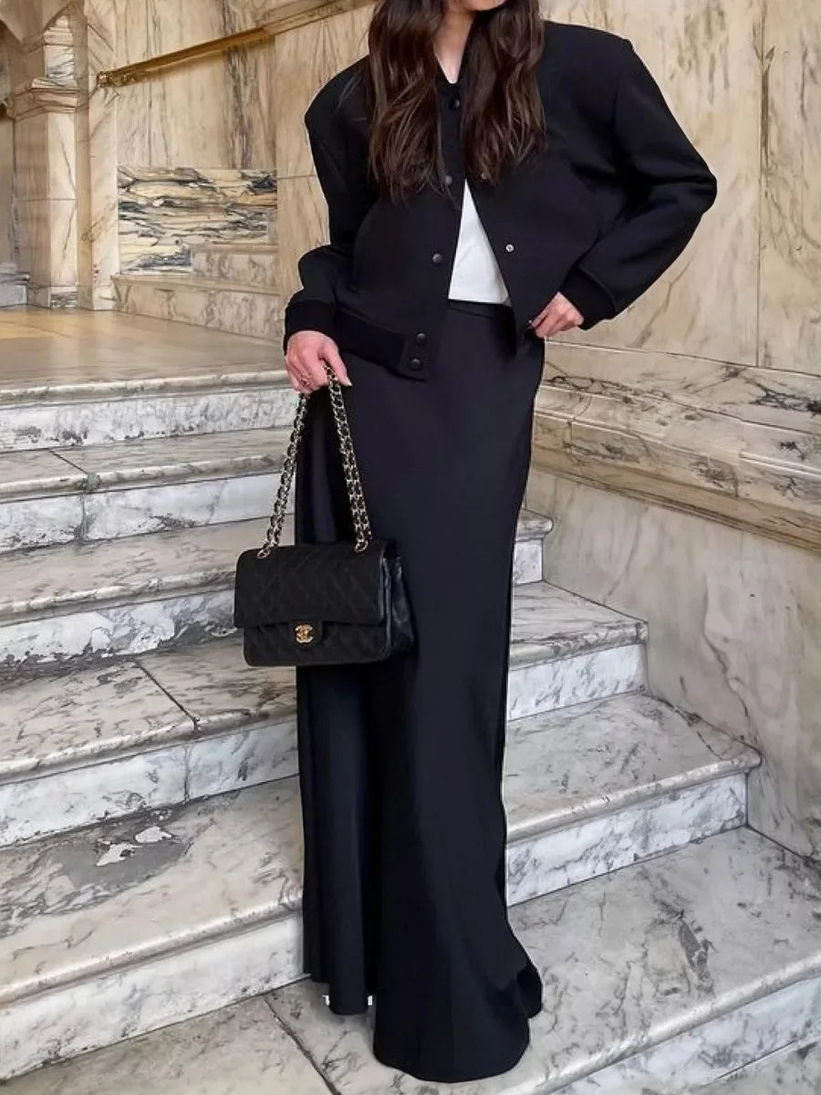 Refined high-waisted fishtail skirt, a chic women's maxi for formal evening.