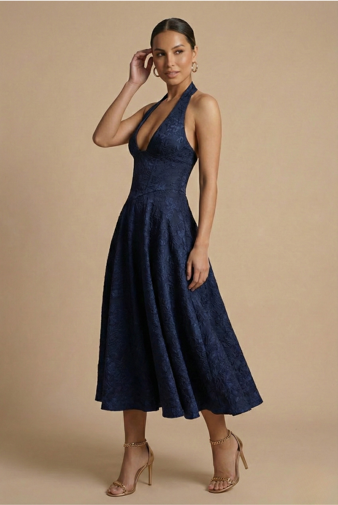 Elegant women's jacquard halter midi dress with A-line skirt & corset bodice. Perfect for wedding guests.