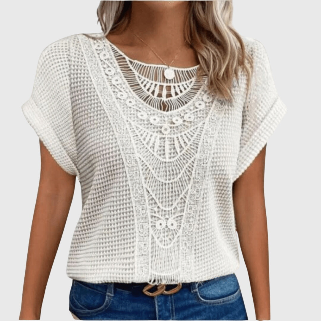 Women's casual chic long-sleeve blouse. Elegant lace and flowy fabric in popular Ibiza fashion style.
