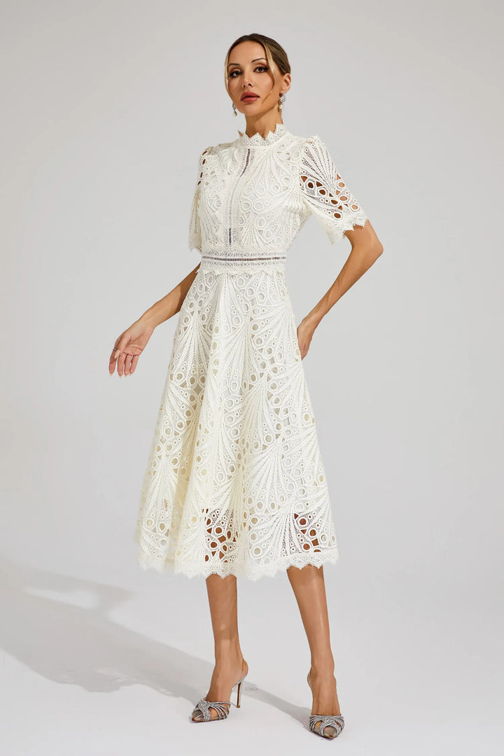 Formal white lace midi dress for women, tailored for elegant wedding guest attire & celebrations.
