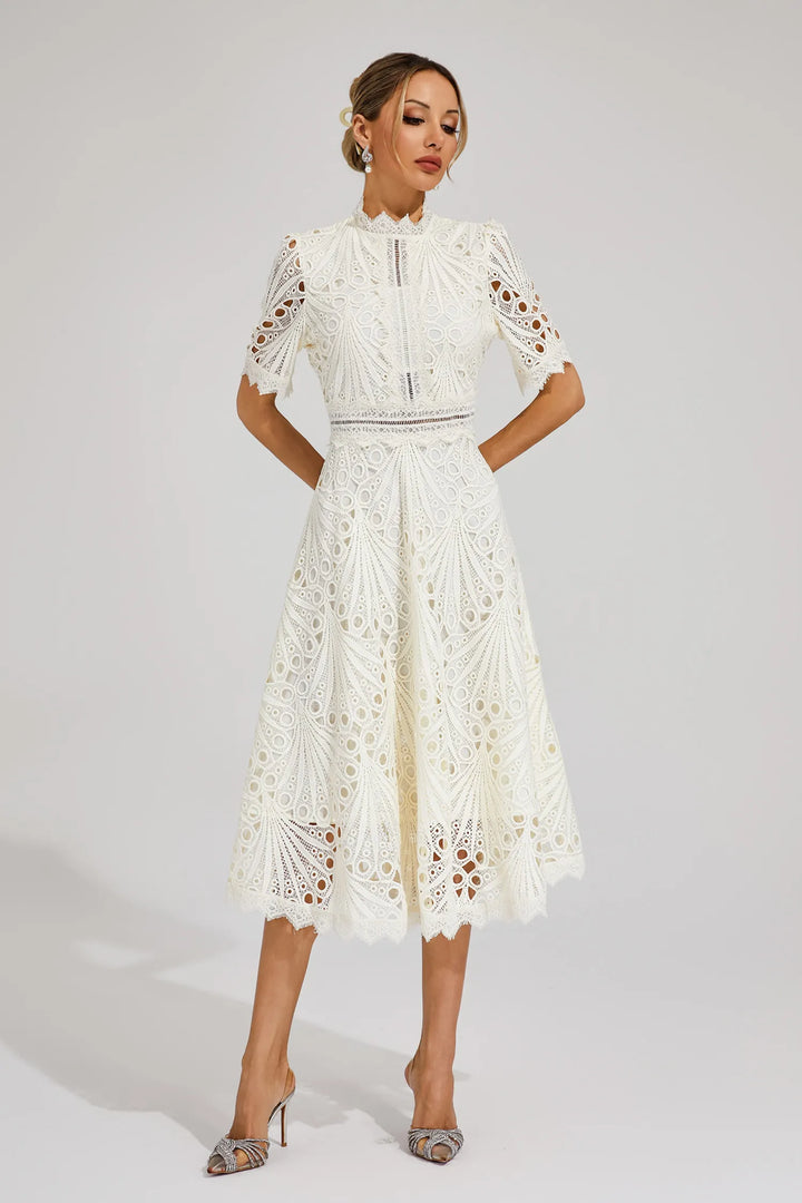 Sophisticated midi length lace dress, elegant women's wear for special events and wedding guests.