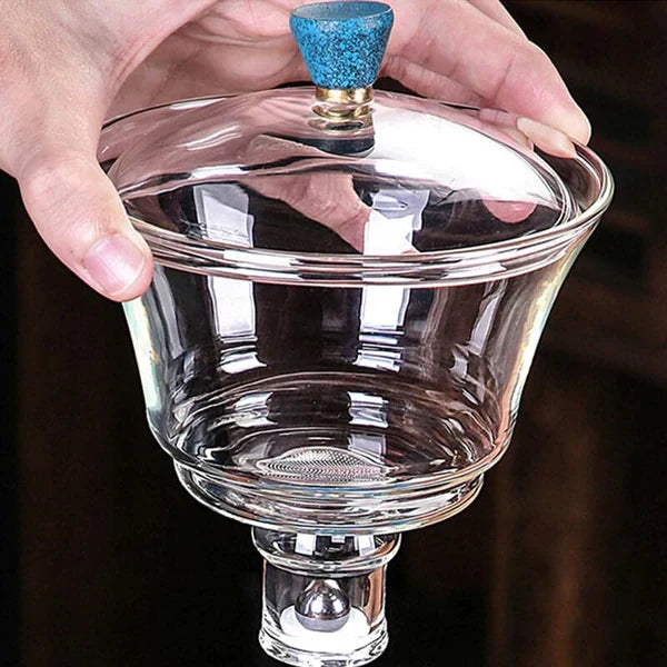 Stylish magnetic automatic tea set with glass components for an elegant tea ceremony.
