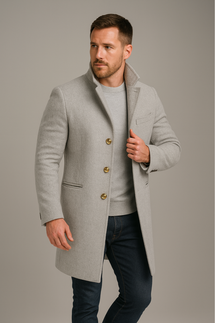 Classic men's black long trench coat with sophisticated gold buttons, designed for elegant formal and smart casual attire.