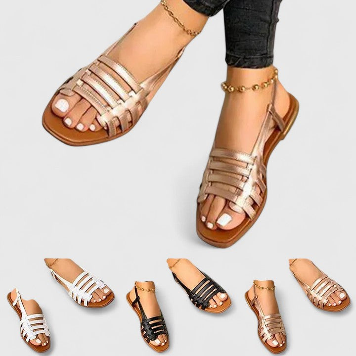 Elegant metallic woven slingback flat sandals for women, featuring open toe design & comfortable summer style.