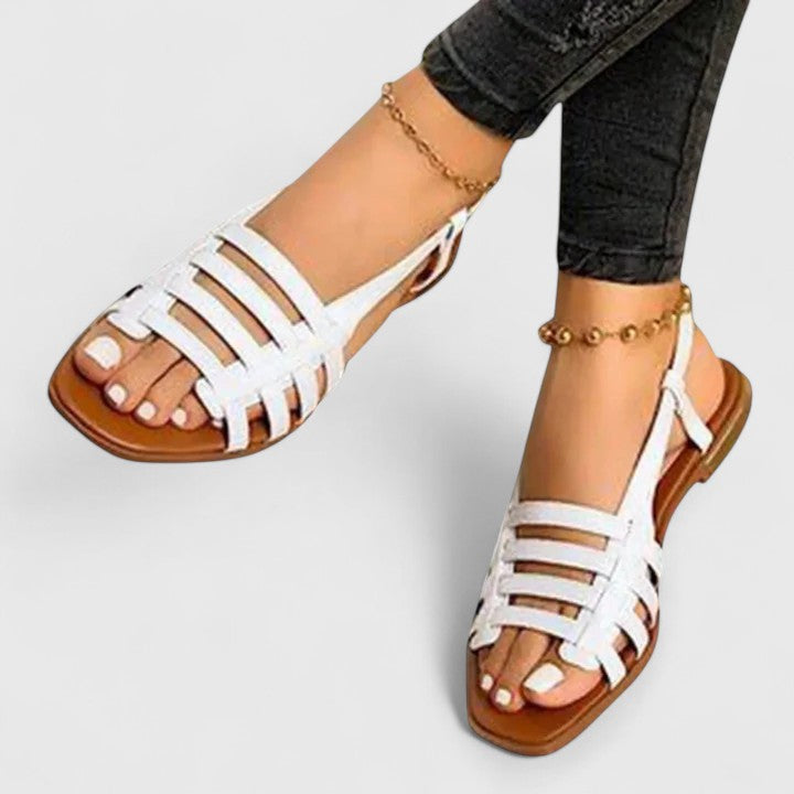 Casual & comfortable metallic woven flat sandals for women, perfect for summer with an open-toe slingback design.