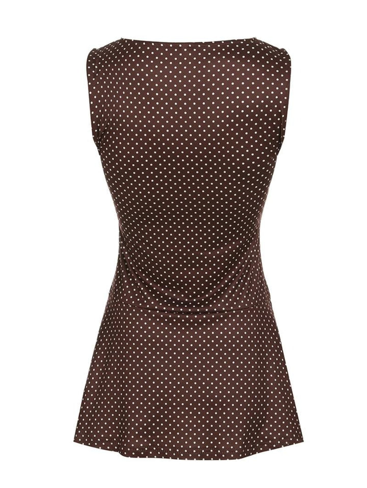 Stylish brown polka dot midi dress for women, highlighting its elegant design and flattering fit.