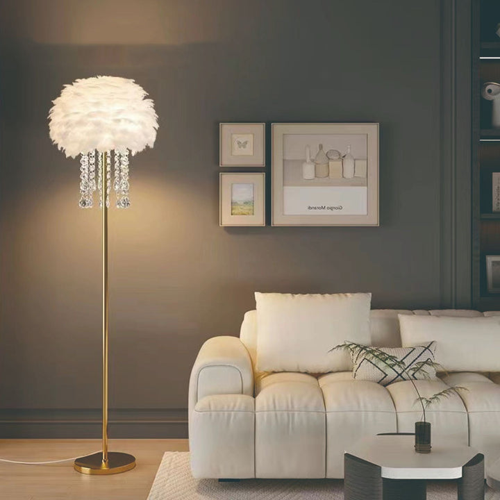 Close-up of elegant feather and sparkling crystal details on a Nordic style floor lamp.