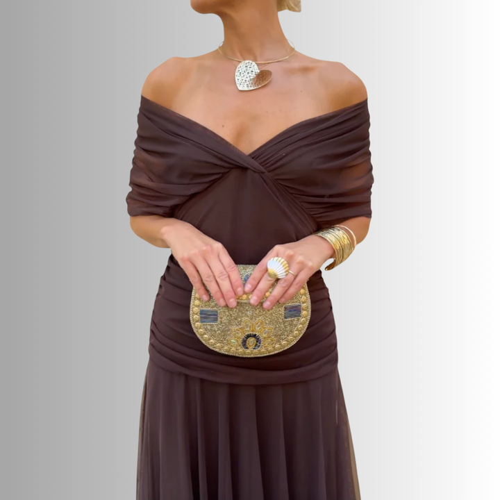 Elegant off-shoulder maxi dress for women, perfect for evening events, special occasions & parties.