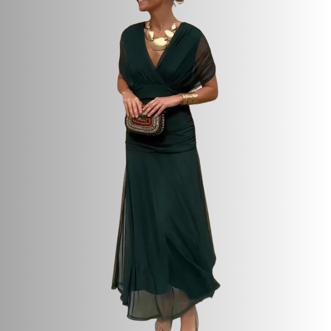 Elegant flowing off-shoulder maxi dress, a beautiful long formal gown for women's special occasion parties.