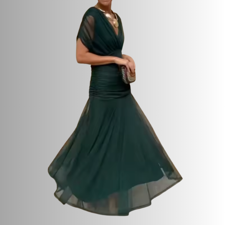 Detailed bodice of an elegant off-shoulder women's evening maxi dress, perfect for formal special events.