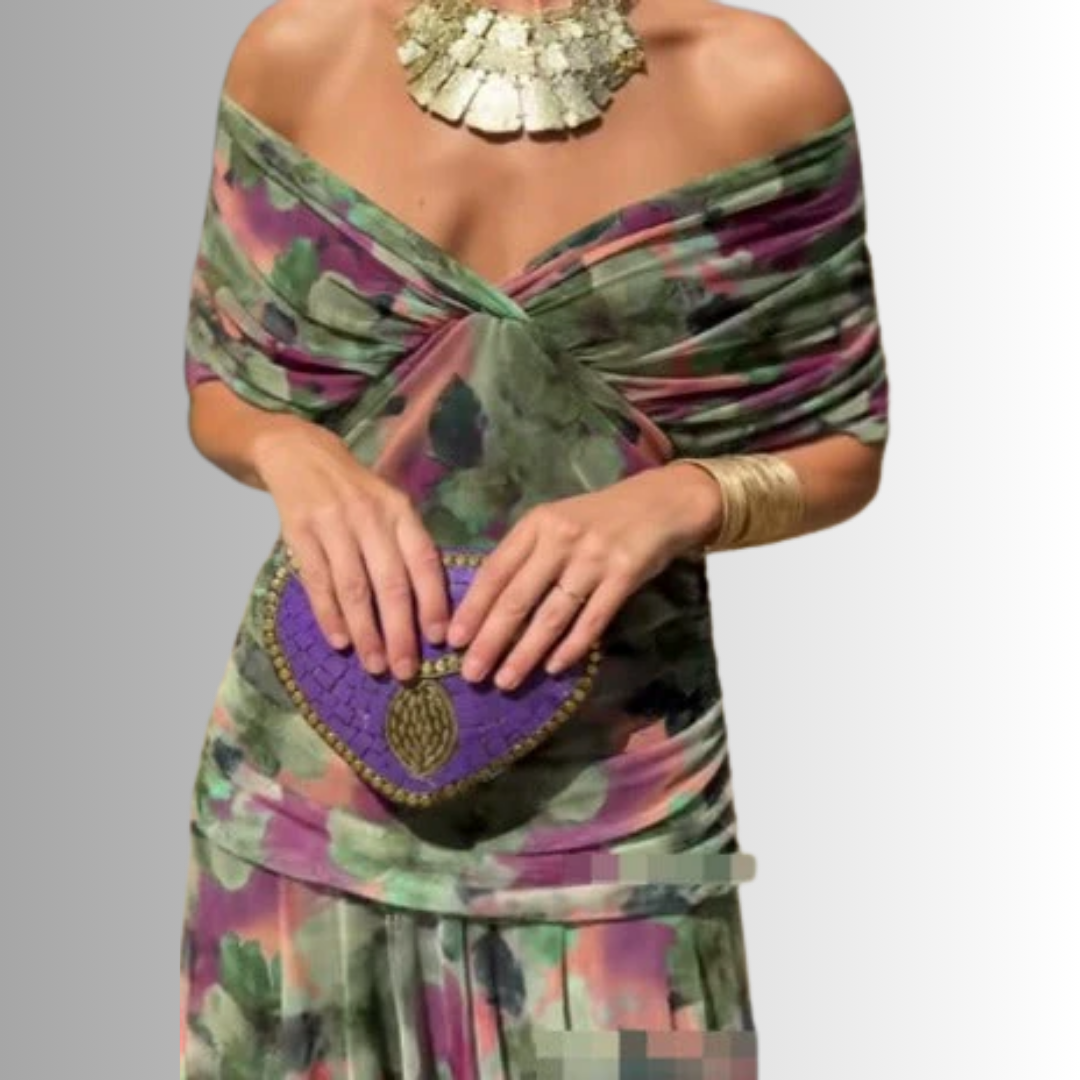 Sophisticated off-shoulder neckline on a flowing women's maxi dress, ideal for galas & formal evenings.