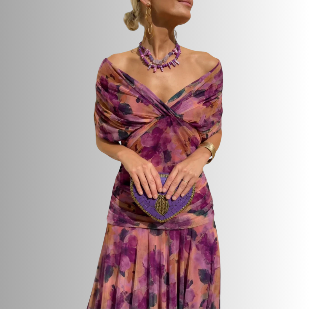 Luxurious flowing fabric of an elegant off-shoulder evening maxi dress for women, a long party gown.