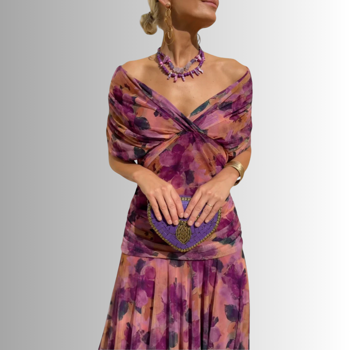 Luxurious flowing fabric of an elegant off-shoulder evening maxi dress for women, a long party gown.