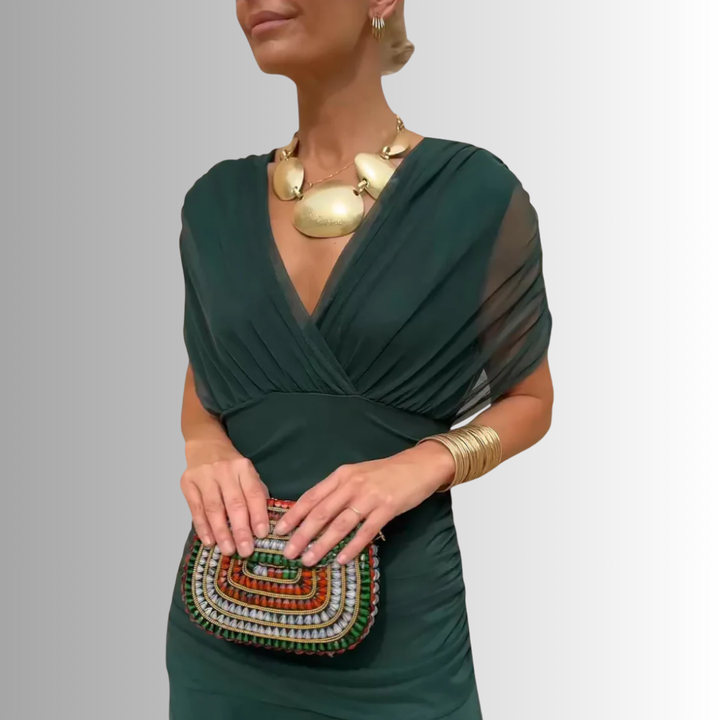 Chic off-shoulder maxi dress, perfect wedding guest attire or formal party dress for women's special occasion.